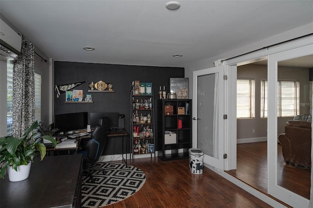 office space with dark wood-type flooring