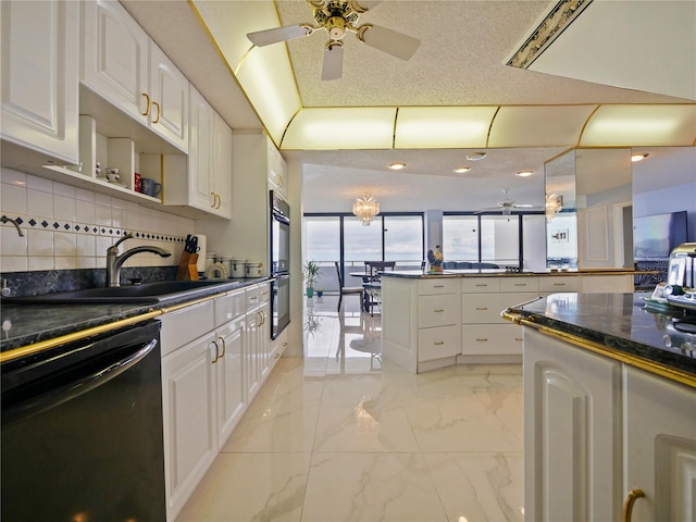 kitchen with sink, tasteful backsplash, black appliances, and white cabinets