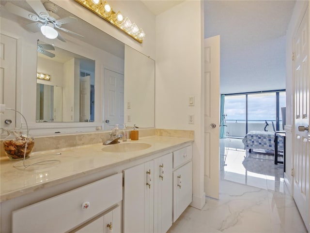 bathroom featuring vanity and ceiling fan