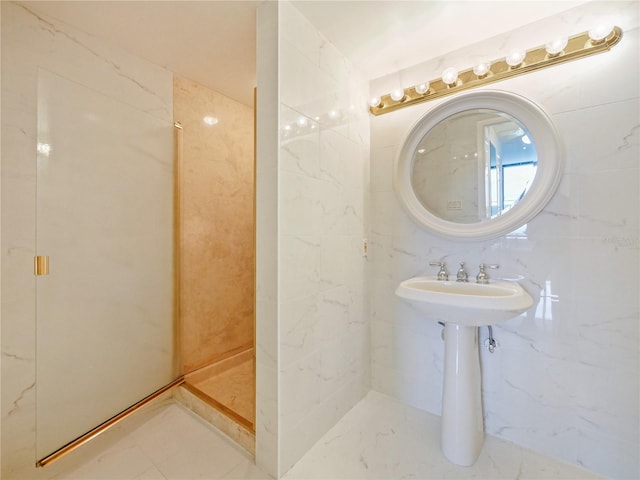 bathroom featuring tile walls and walk in shower