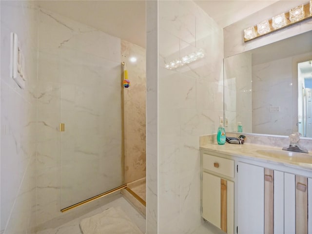 bathroom featuring a shower, tile walls, and vanity