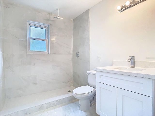 4502 Florence St, Apopka, FL 32712 - bathroom with vanity, a tile shower, and toilet