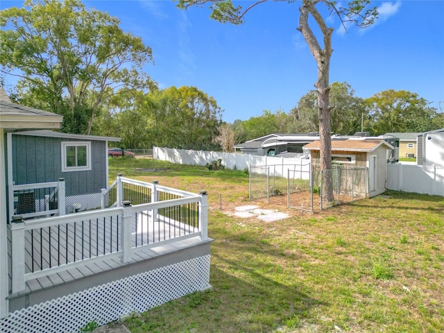 4502 Florence St, Apopka, FL 32712 - view of yard with a deck and a storage unit