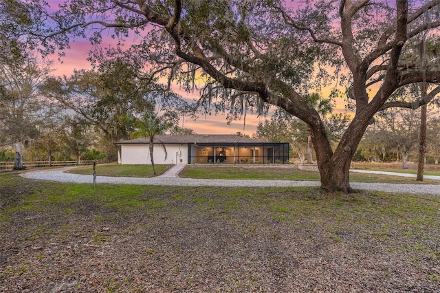 view of front of property with a lawn