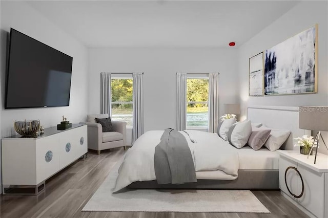 bedroom featuring wood finished floors