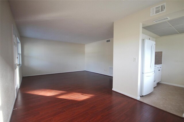 6026 22nd Ave N Unit 4, Saint Petersburg, FL 33710 - unfurnished room with dark hardwood / wood-style flooring