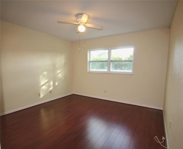 6026 22nd Ave N Unit 4, Saint Petersburg, FL 33710 - unfurnished room featuring ceiling fan and dark wood-type flooring