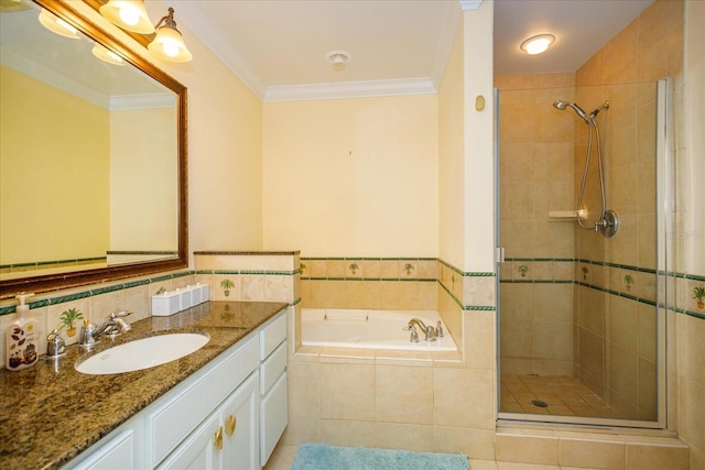 bathroom featuring ornamental molding, a stall shower, vanity, and a bath