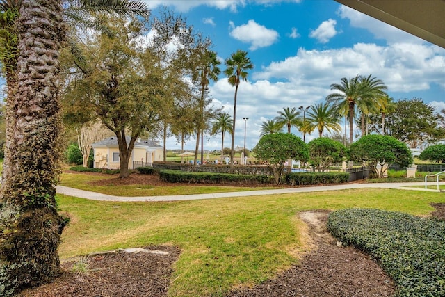 view of home's community featuring a yard