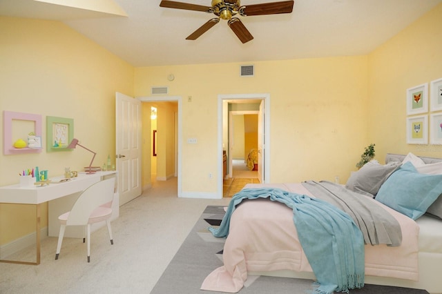 bedroom with baseboards, a ceiling fan, visible vents, and light colored carpet