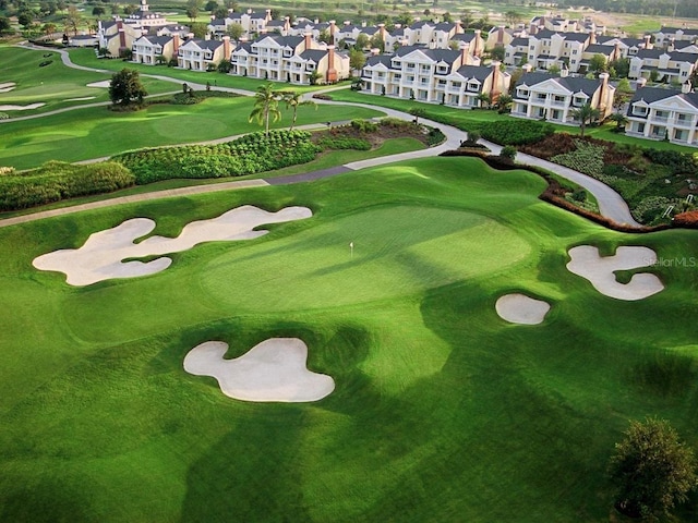 view of property's community featuring a residential view and golf course view