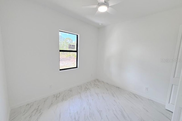 empty room featuring ceiling fan