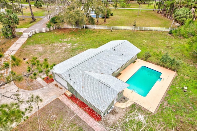 birds eye view of property with a rural view