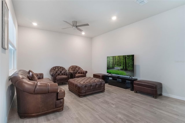 living room featuring visible vents, ceiling fan, light wood-style flooring, and recessed lighting