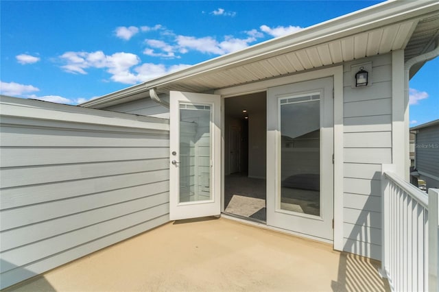 entrance to property with a patio area