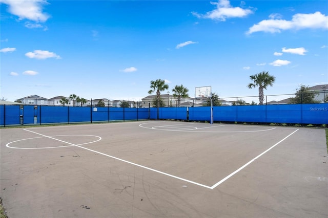 view of sport court featuring community basketball court and fence