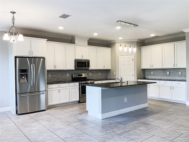 6113 Shadowlake Dr, Apollo Beach, FL 33572 - kitchen featuring stainless steel appliances, crown molding, decorative backsplash, white cabinetry, and decorative light fixtures
