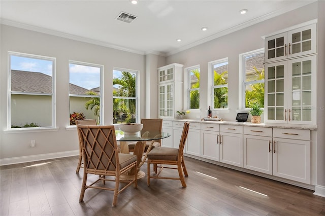 sunroom / solarium featuring visible vents