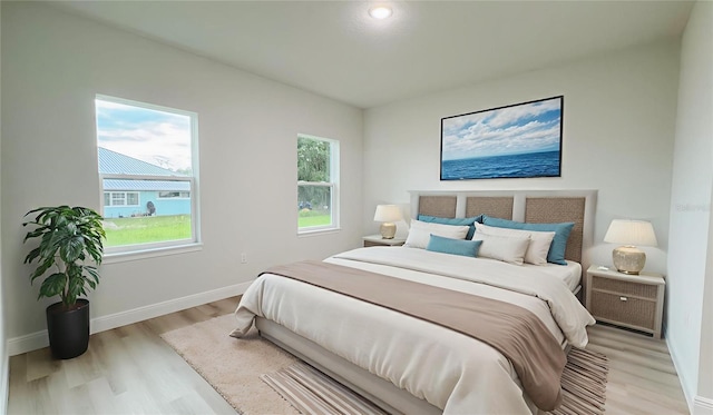 656 Marion Oaks Mnr, Ocala, FL 34473 - bedroom featuring light wood-style flooring