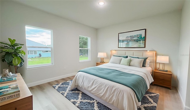 656 Marion Oaks Mnr, Ocala, FL 34473 - bedroom with light wood-type flooring