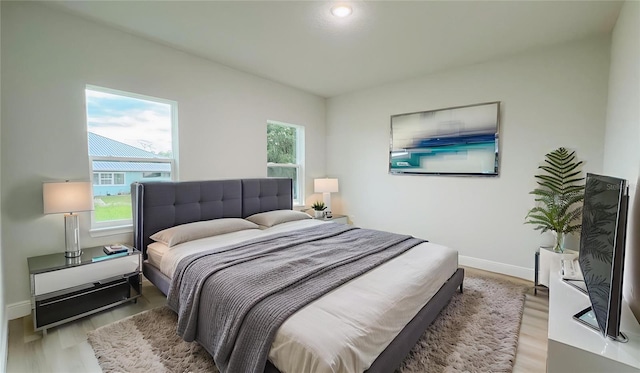 656 Marion Oaks Mnr, Ocala, FL 34473 - bedroom featuring wood finished floors