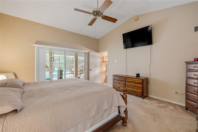 carpeted bedroom with access to exterior, lofted ceiling, and ceiling fan