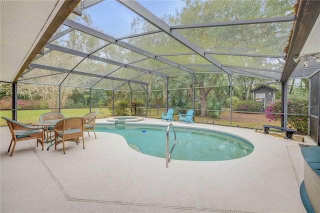 view of swimming pool with a patio, an in ground hot tub, and glass enclosure