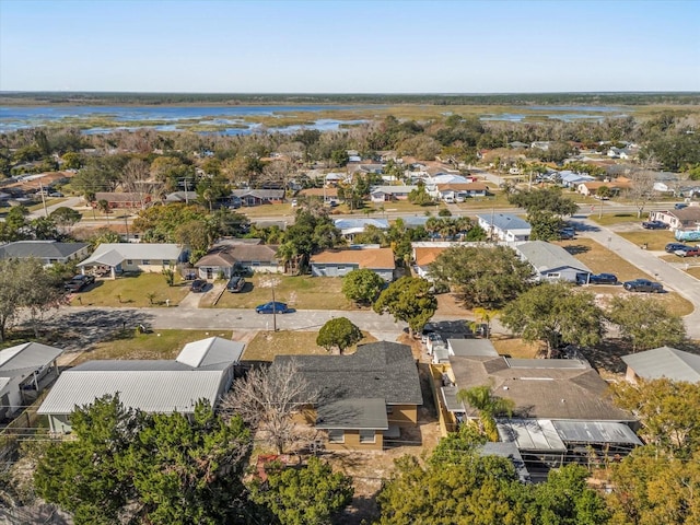 aerial view with a residential view and a water view