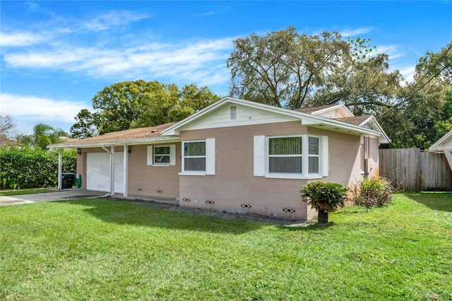 view of property exterior with a garage and a lawn