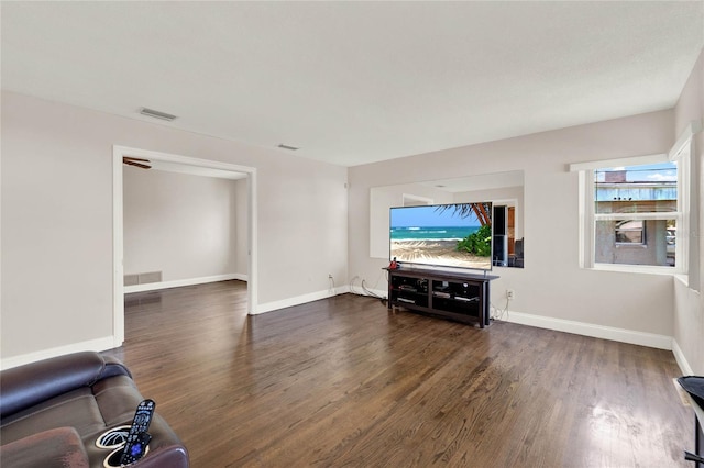 living room featuring dark hardwood / wood-style flooring