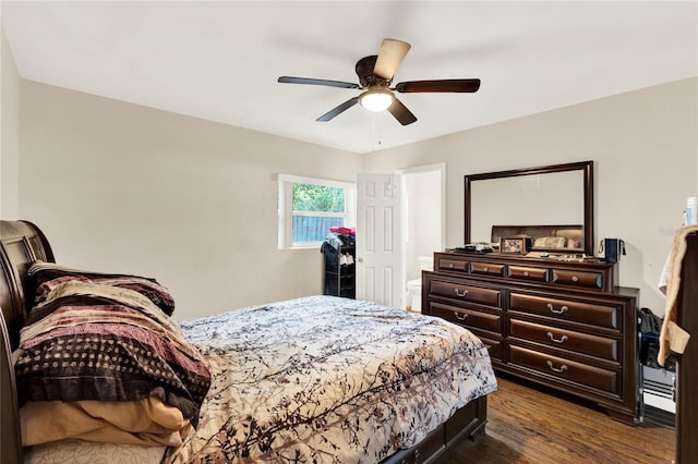 bedroom featuring ceiling fan and dark wood-type flooring