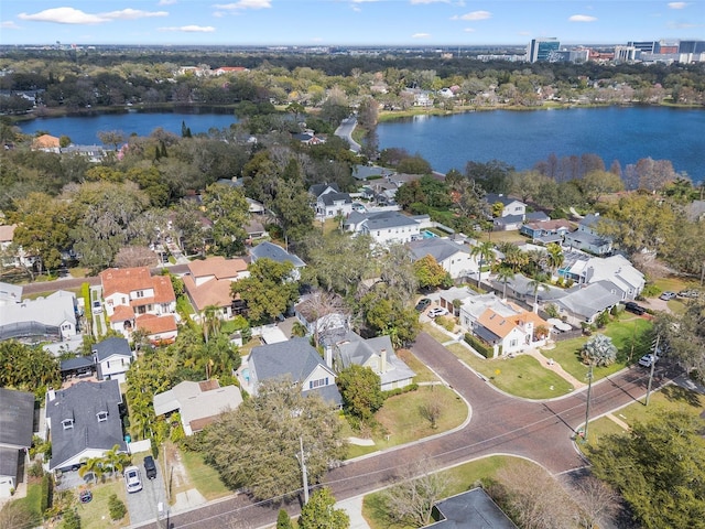 bird's eye view with a residential view and a water view