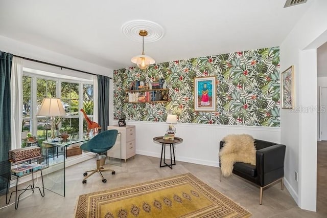 office area featuring visible vents, wainscoting, and wallpapered walls