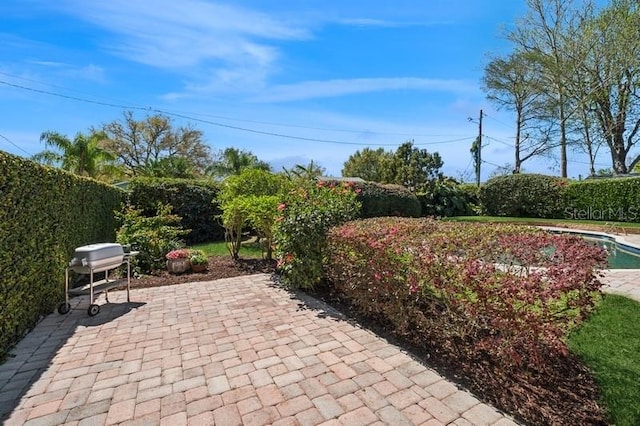 view of patio featuring grilling area and fence private yard