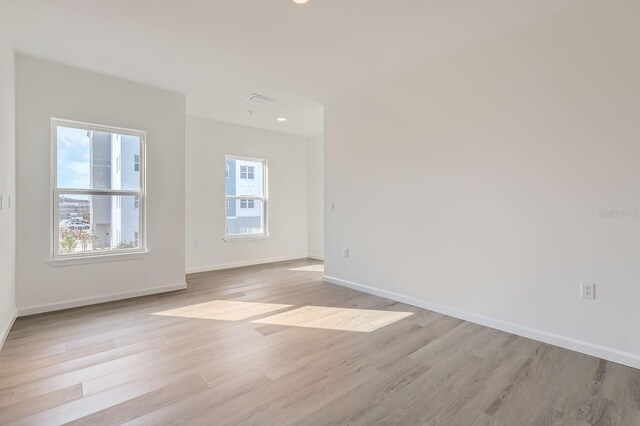 1209 S Station Pl Unit 306, Orlando, FL 32809 - empty room featuring light wood-style flooring and baseboards