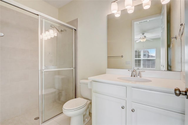 full bathroom featuring visible vents, toilet, a stall shower, ceiling fan, and vanity