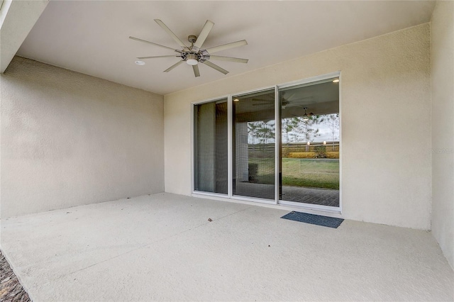 view of patio featuring ceiling fan