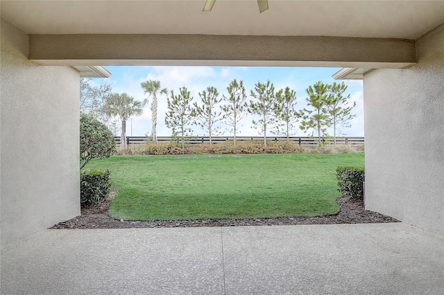 view of yard featuring a patio area and fence