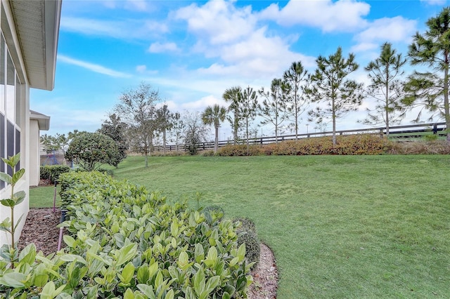 view of yard featuring fence