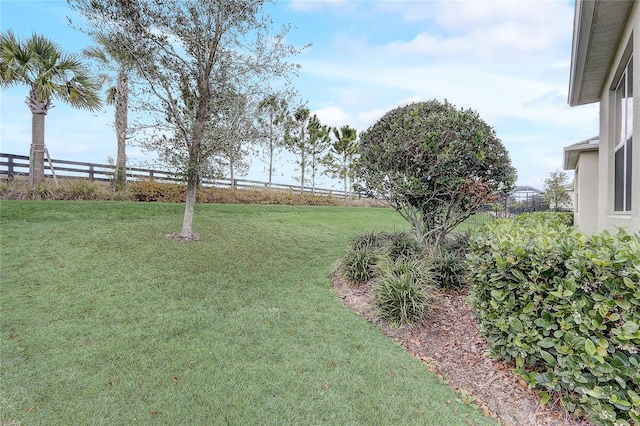 view of yard featuring fence