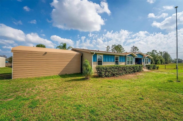 exterior space featuring a lawn