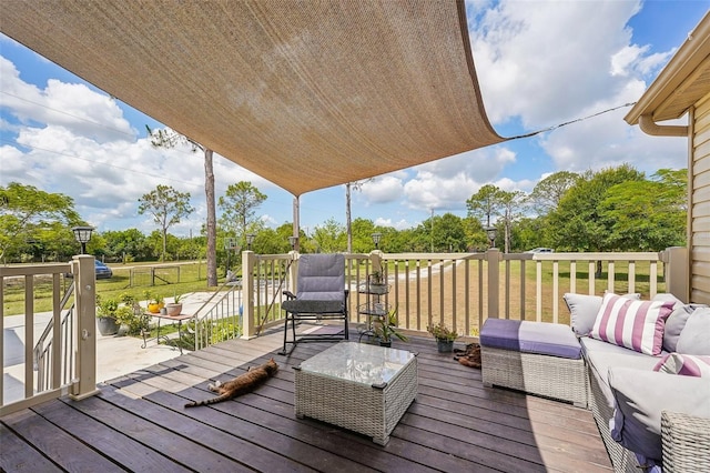 wooden deck featuring outdoor lounge area