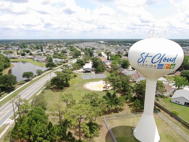 bird's eye view with a water view and a residential view