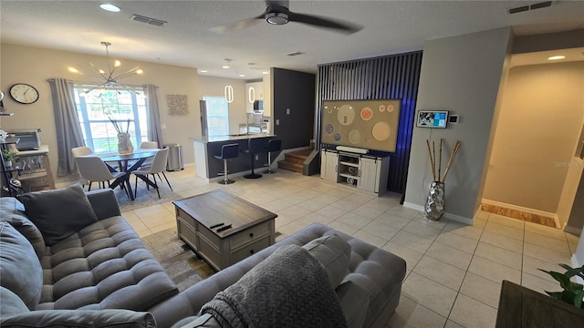136 Mcleods Way, Winter Springs, FL 32708 - living area with light tile patterned floors, ceiling fan, a chandelier, recessed lighting, and baseboards