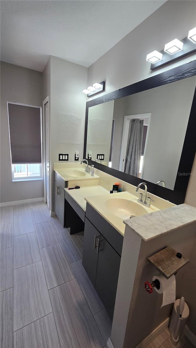136 Mcleods Way, Winter Springs, FL 32708 - full bathroom featuring vanity and baseboards