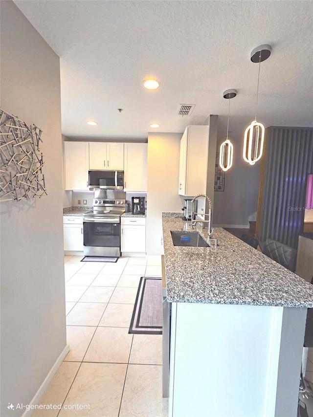 136 Mcleods Way, Winter Springs, FL 32708 - kitchen featuring appliances with stainless steel finishes, a sink, light stone countertops, hanging light fixtures, and recessed lighting