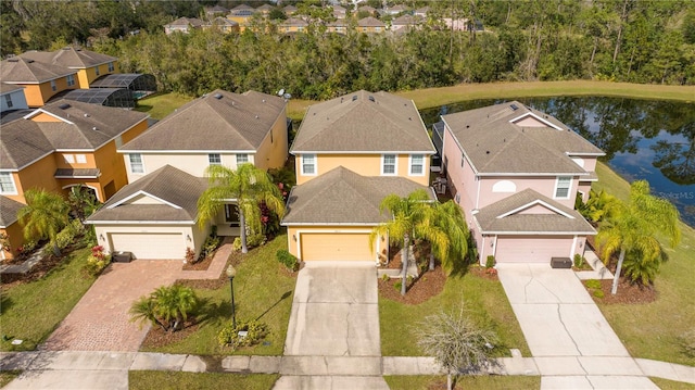 aerial view with a residential view and a water view