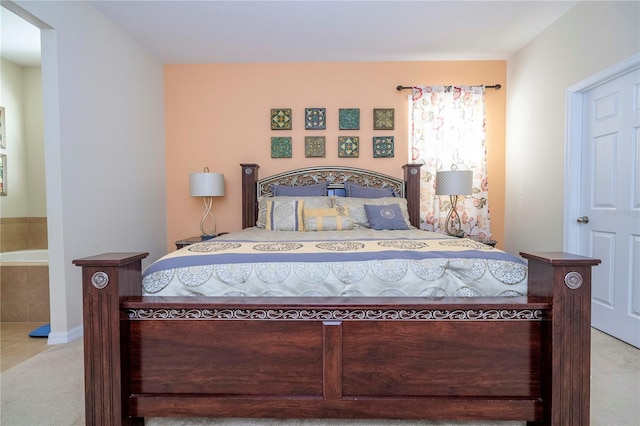 bedroom with light colored carpet