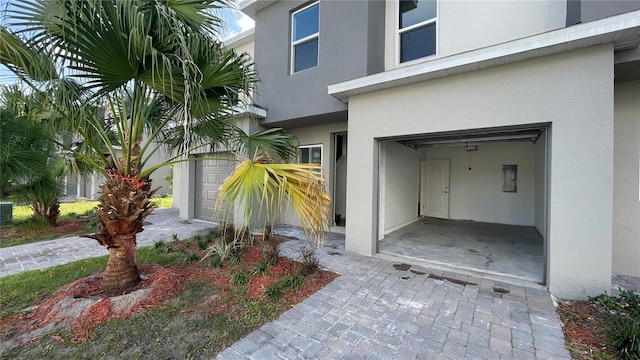 entrance to property featuring a garage