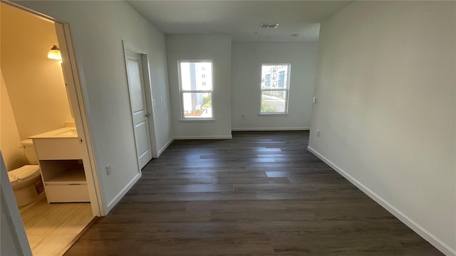 interior space with dark hardwood / wood-style flooring